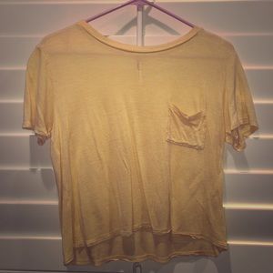thin yellow shirt